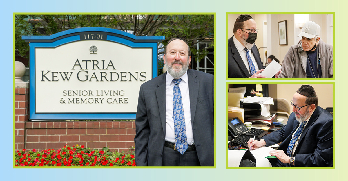 Rabbi stands next to Atria Kew Gardens senior living community monument sign.