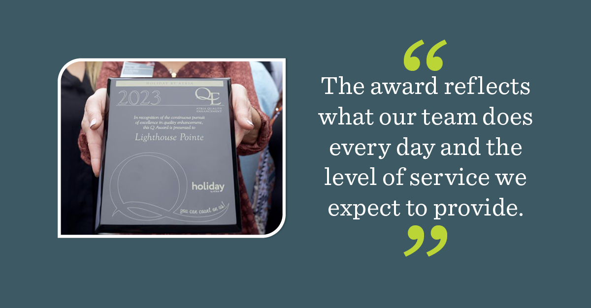 Close-up view of Quality Award winning plaque for Holiday Lighthouse Pointe