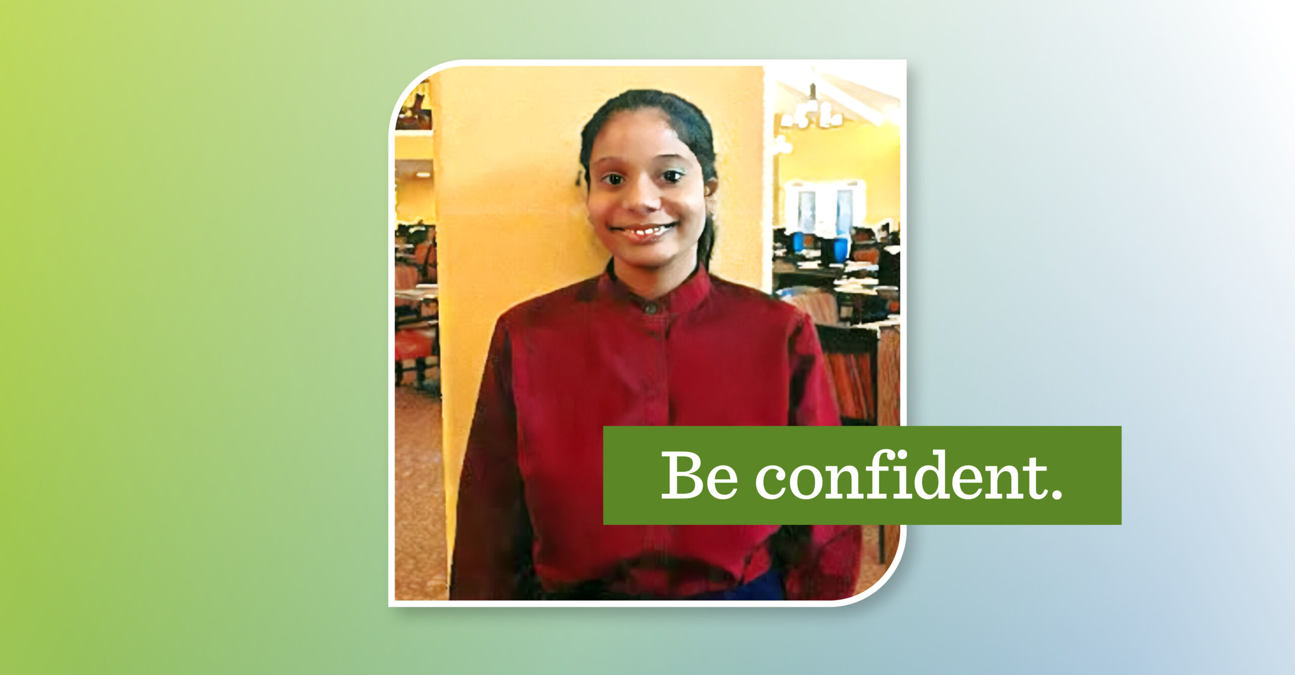 young woman smiling, wearing a red button up shirt. Overlay text reads "be confident"