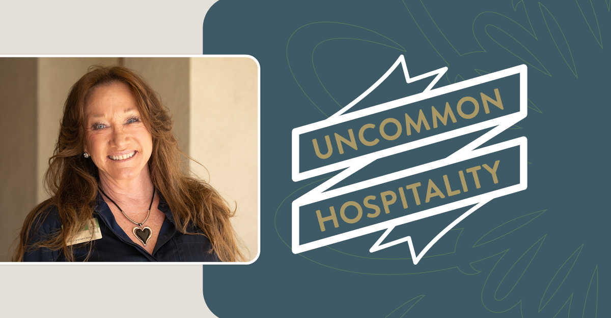 Portrait of a brunette woman with a ribbon in gold text that says "Uncommon Hospitality"