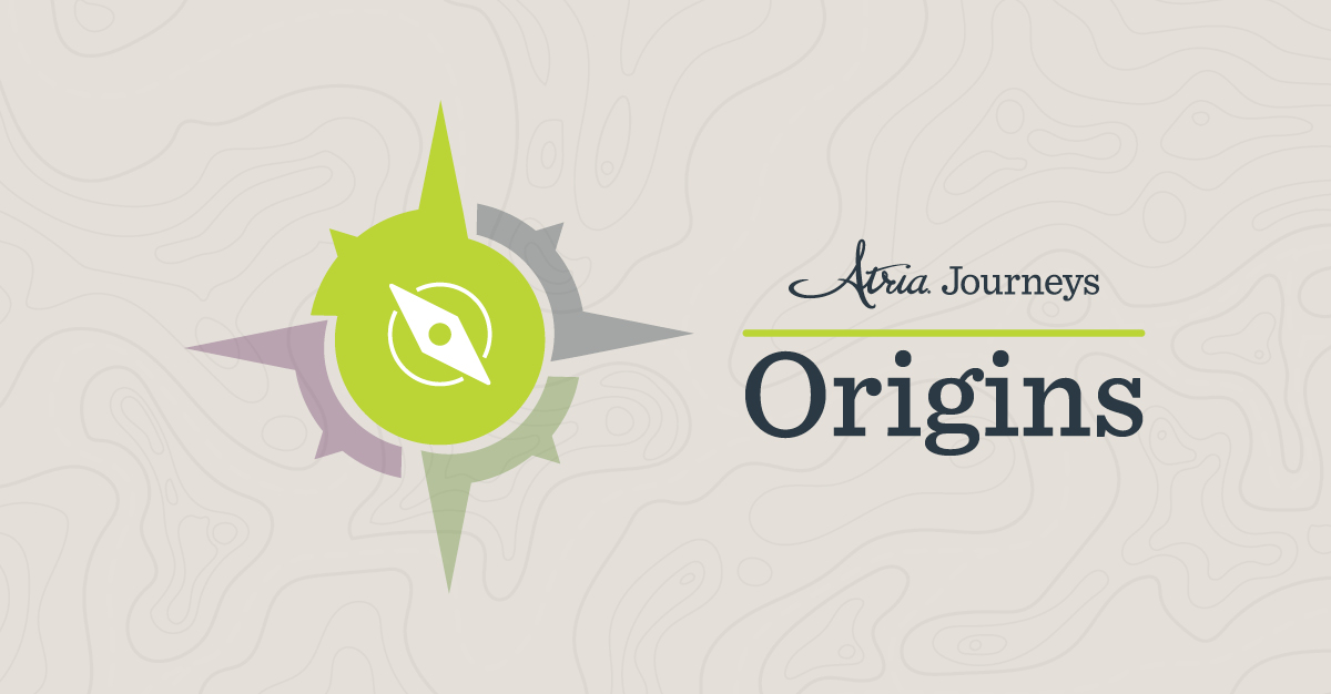 Compass graphic with the words Atria Journeys Origins